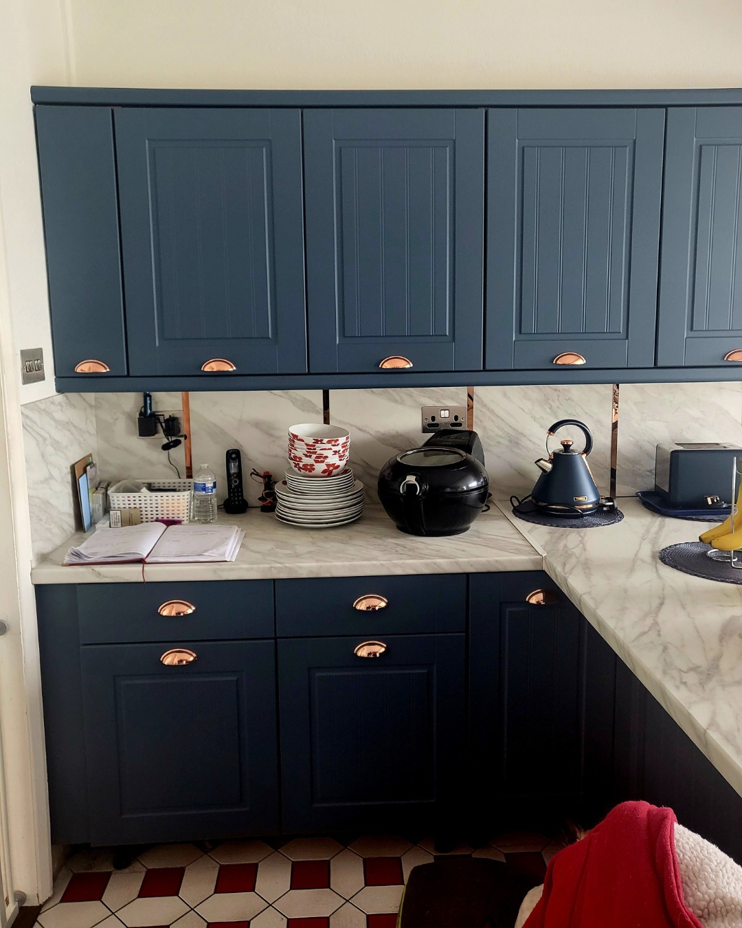 Real customer kitchen featuring indigo blue Newport kitchen doors in a classic shaker style
