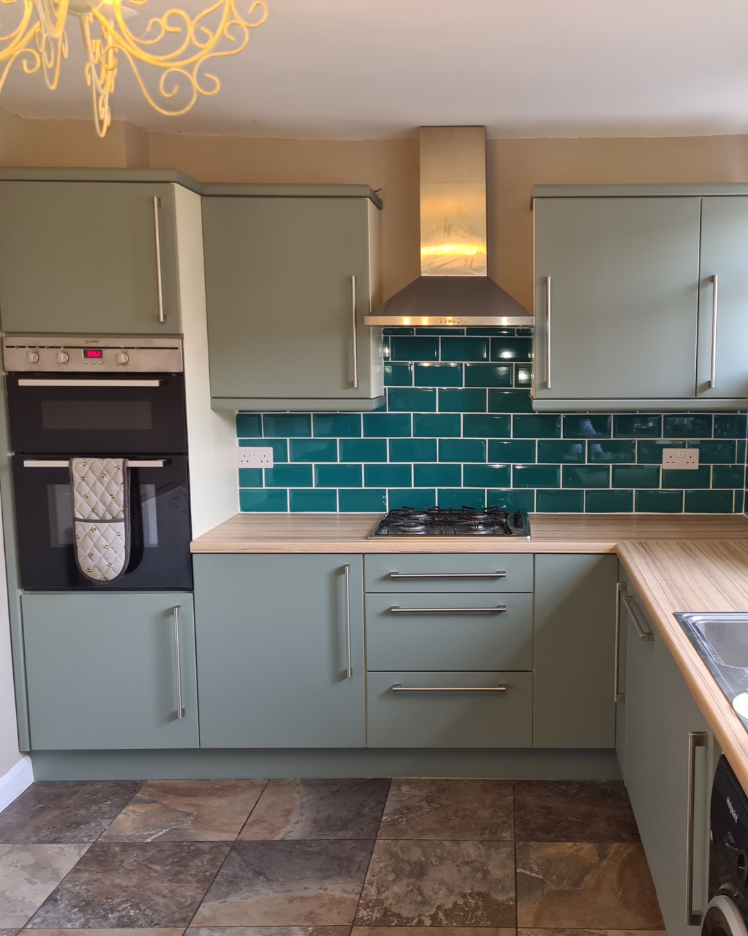 Matt Sage Green Venice Slab Doors in a Contemporary Kitchen