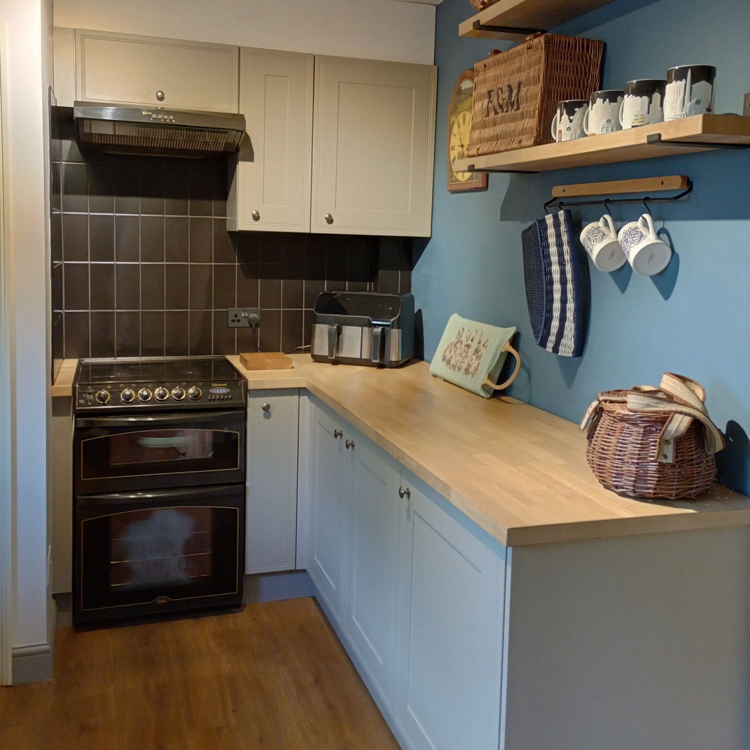 Real customer kitchen with matt stone grey Tullymore kitchen doors in a classic design