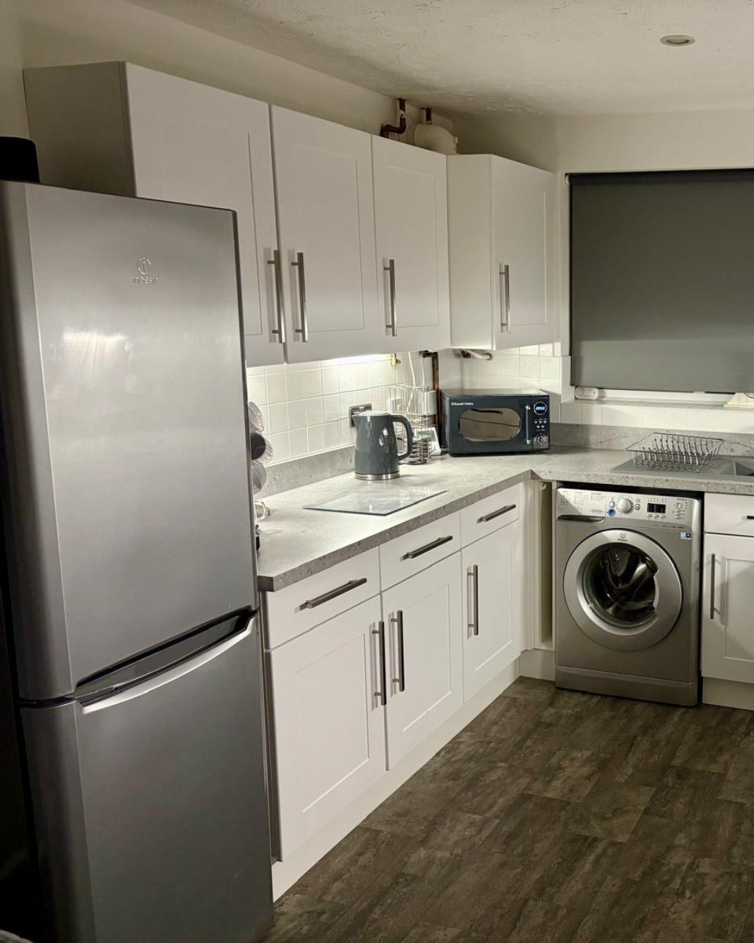 Real customer kitchen with porcelain white shaker kitchen doors in a classic timeless design