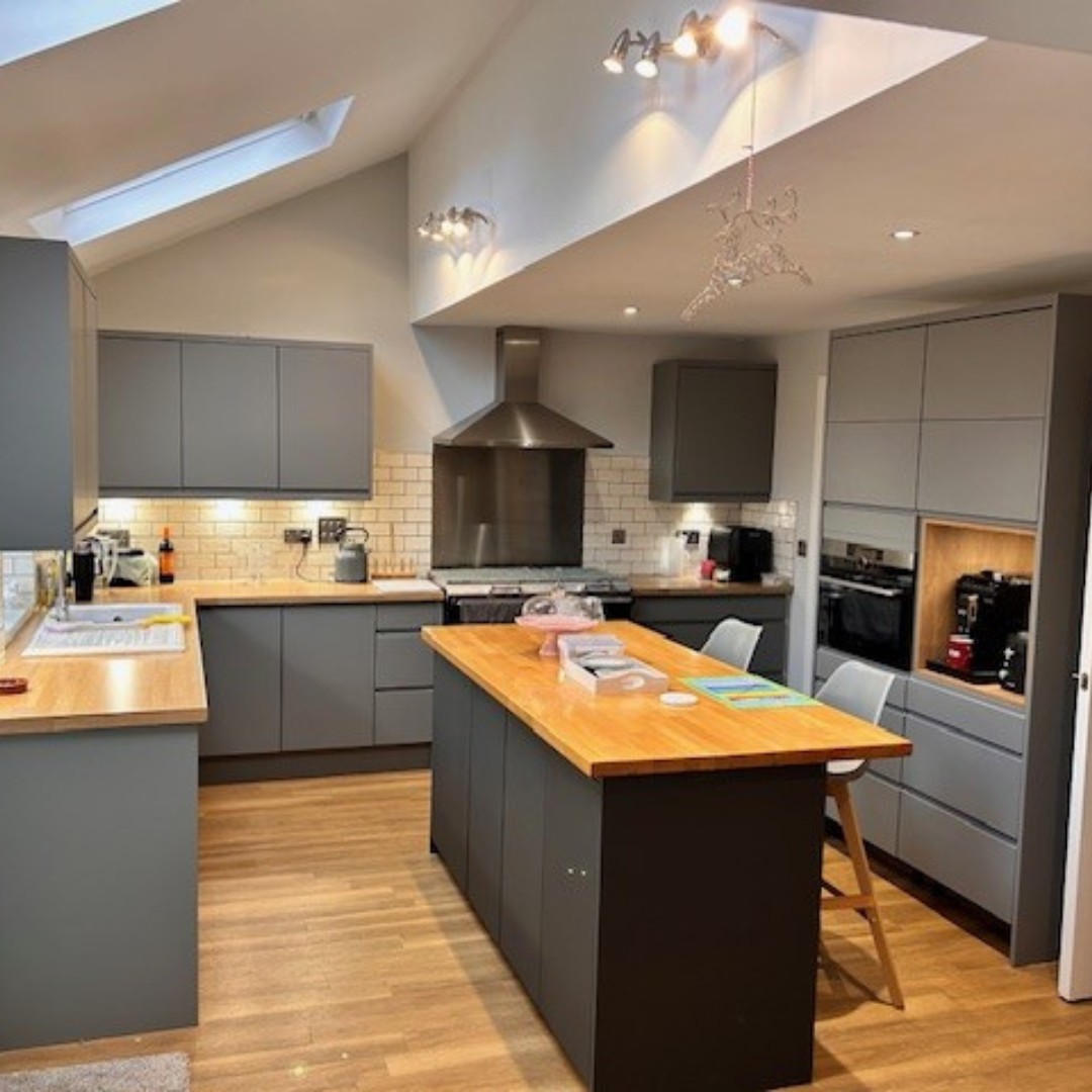 Customer kitchen featuring super matt dust grey handleless kitchen doors with a smooth, understated finish