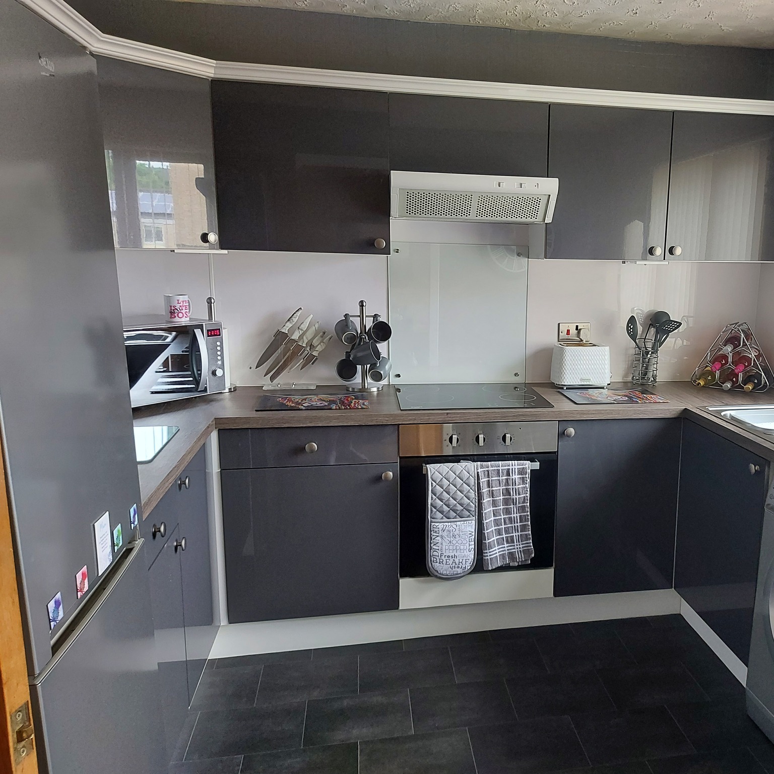 Real Customer Kitchen with Zurfiz Supergloss Dust Grey Slab Doors